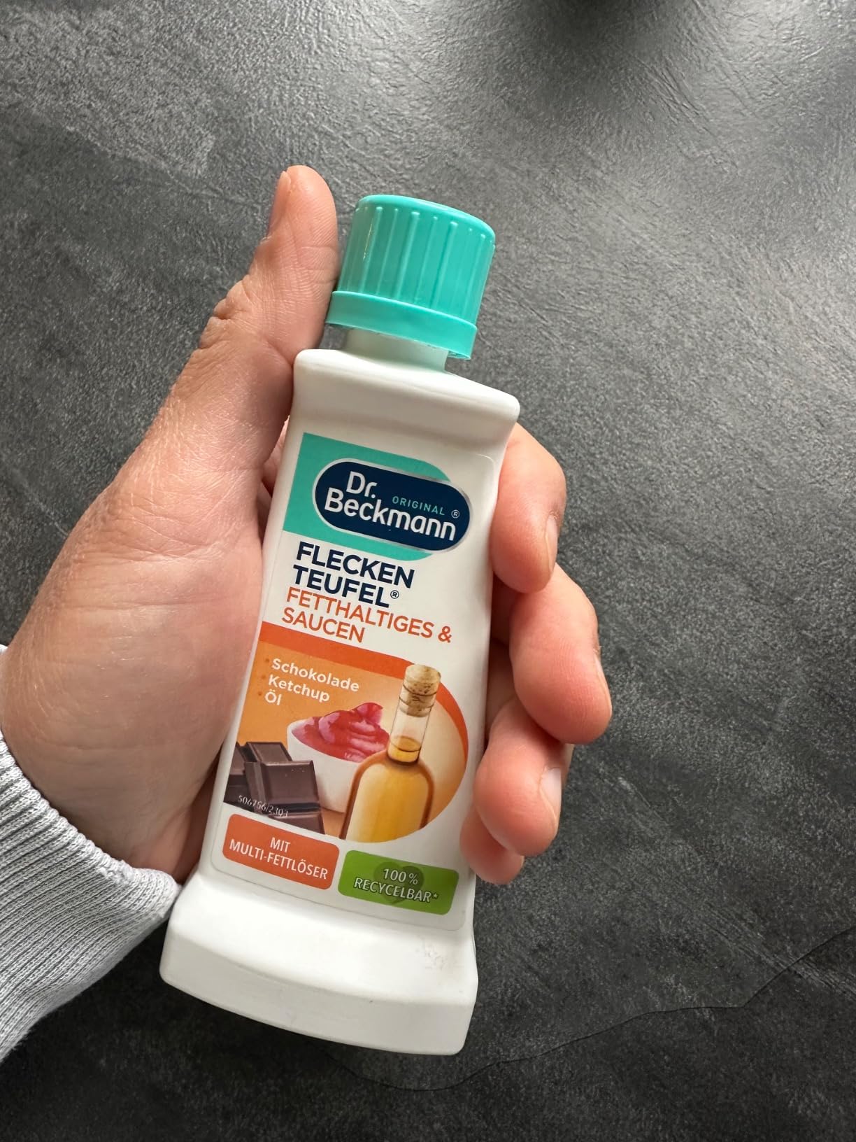 Öl aus Bluse entfernt